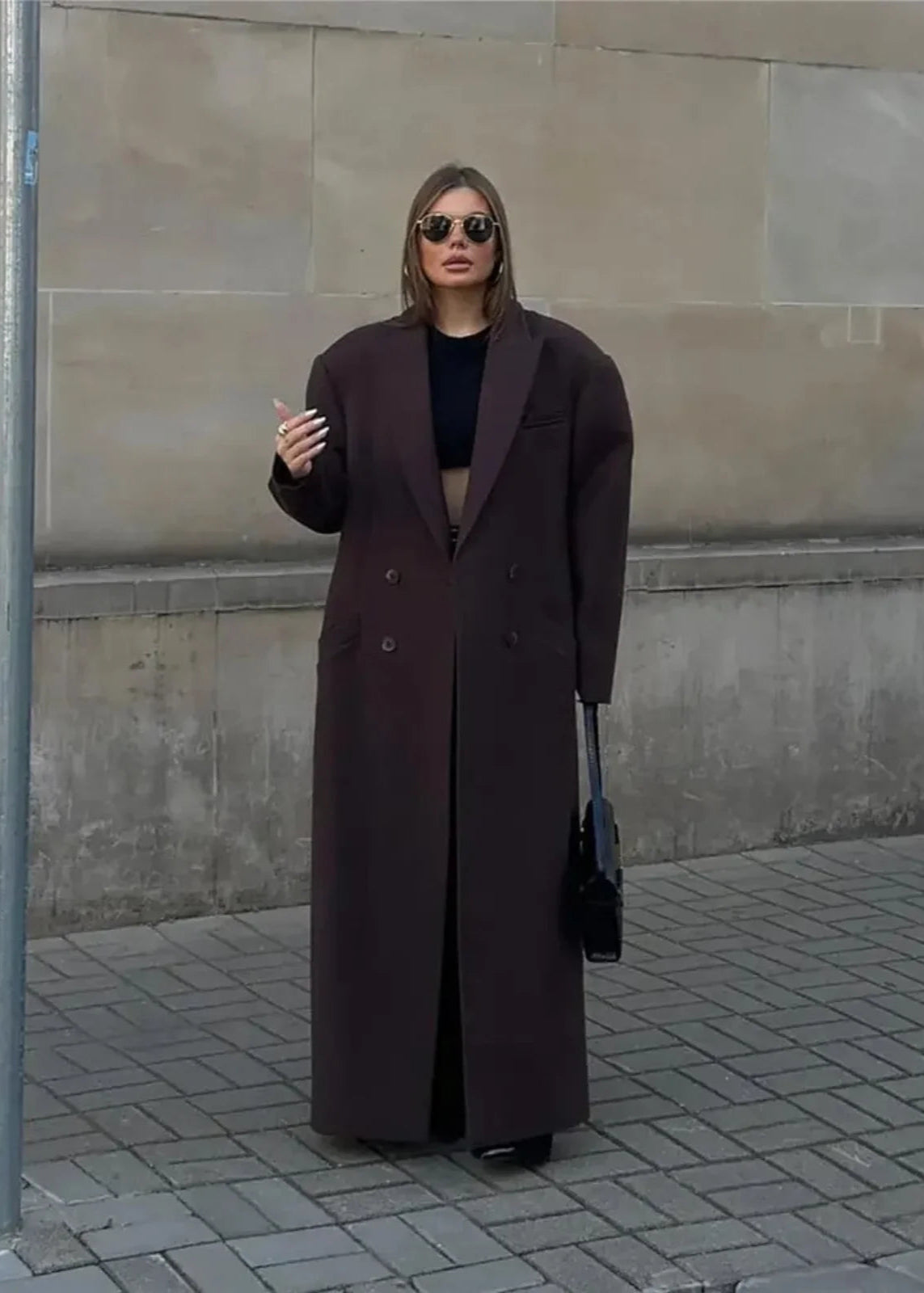 le trench-coat en laine oversize à double boutonnage