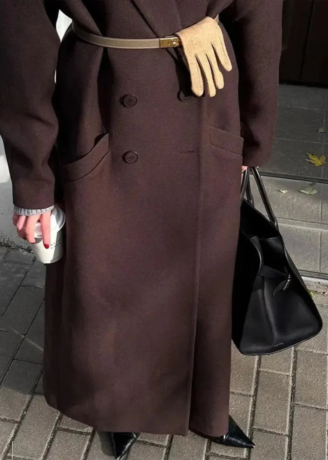 le trench-coat en laine oversize à double boutonnage